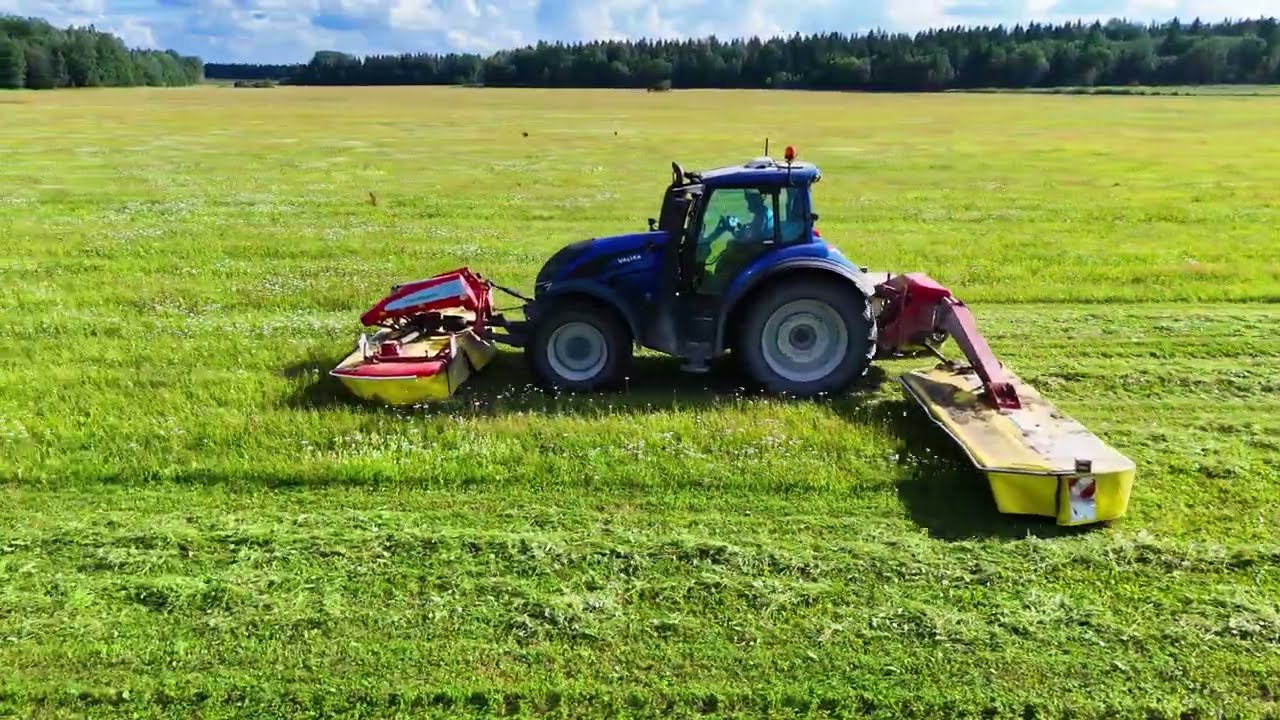 Grassland Mastery: Valtra T234 Direct with Pöttinger Novacat
