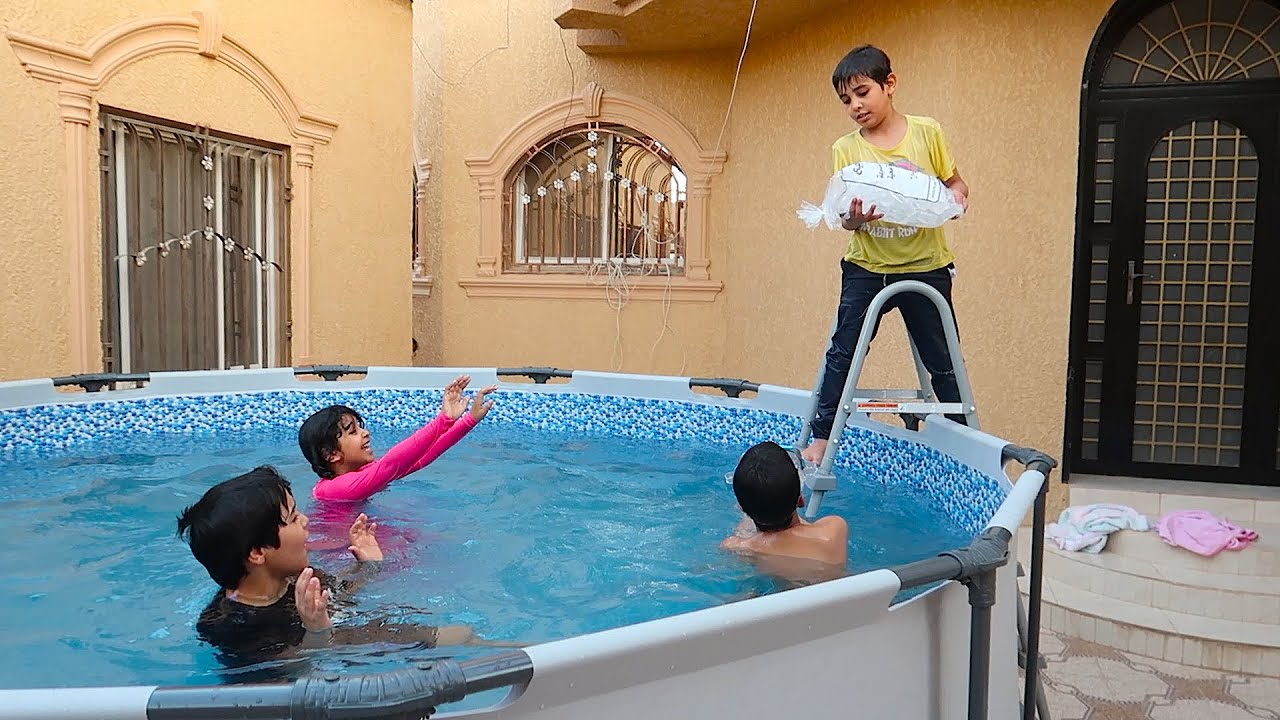 المسبح العملاق وإلياس غرقهم بالثلج   !!