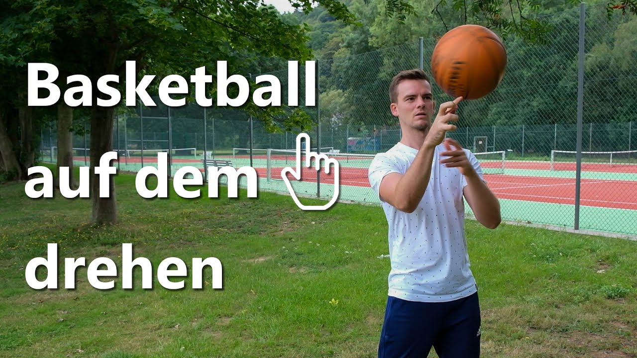 Lernen einen Basketball auf dem Finger zu drehen