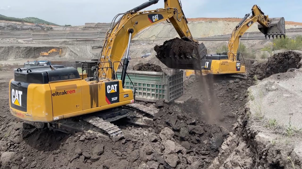 Two Amazing Caterpillar 352F Excavators Loading Trucks
