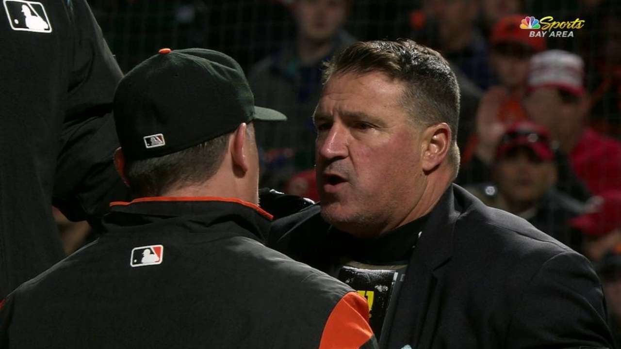 CIN@SF: Home-plate umpire hit twice, exits in extras