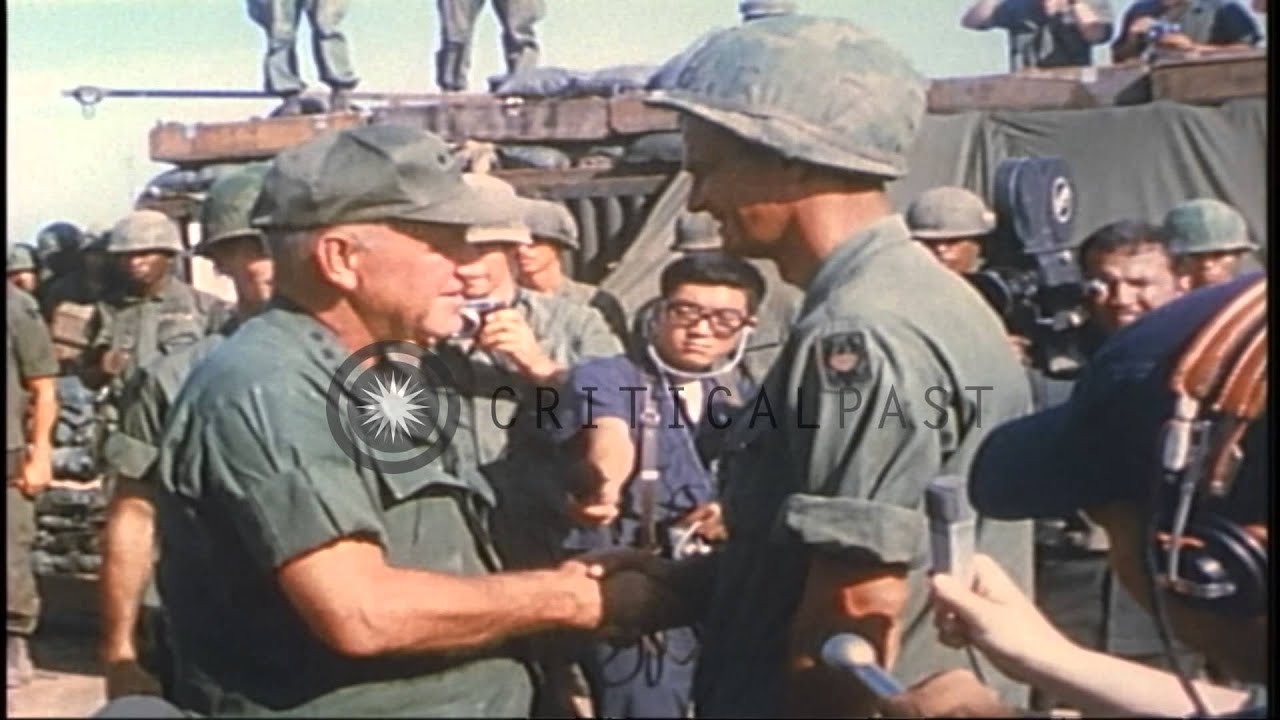General Crieghton Abrams presents a DSC to Chaplain Angelo Liteky at  Fire Base S...HD Stock Footage