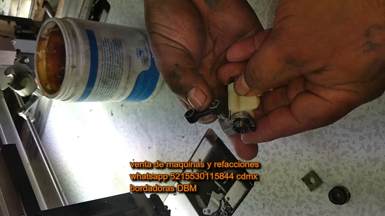 CAMBIO DE catcher o reciprocador EN BORDADORAS DBM FEIYUE ETC