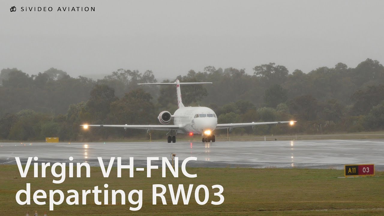 Virgin Australia Regional (VH-FNC) departing a wet Perth Airport.