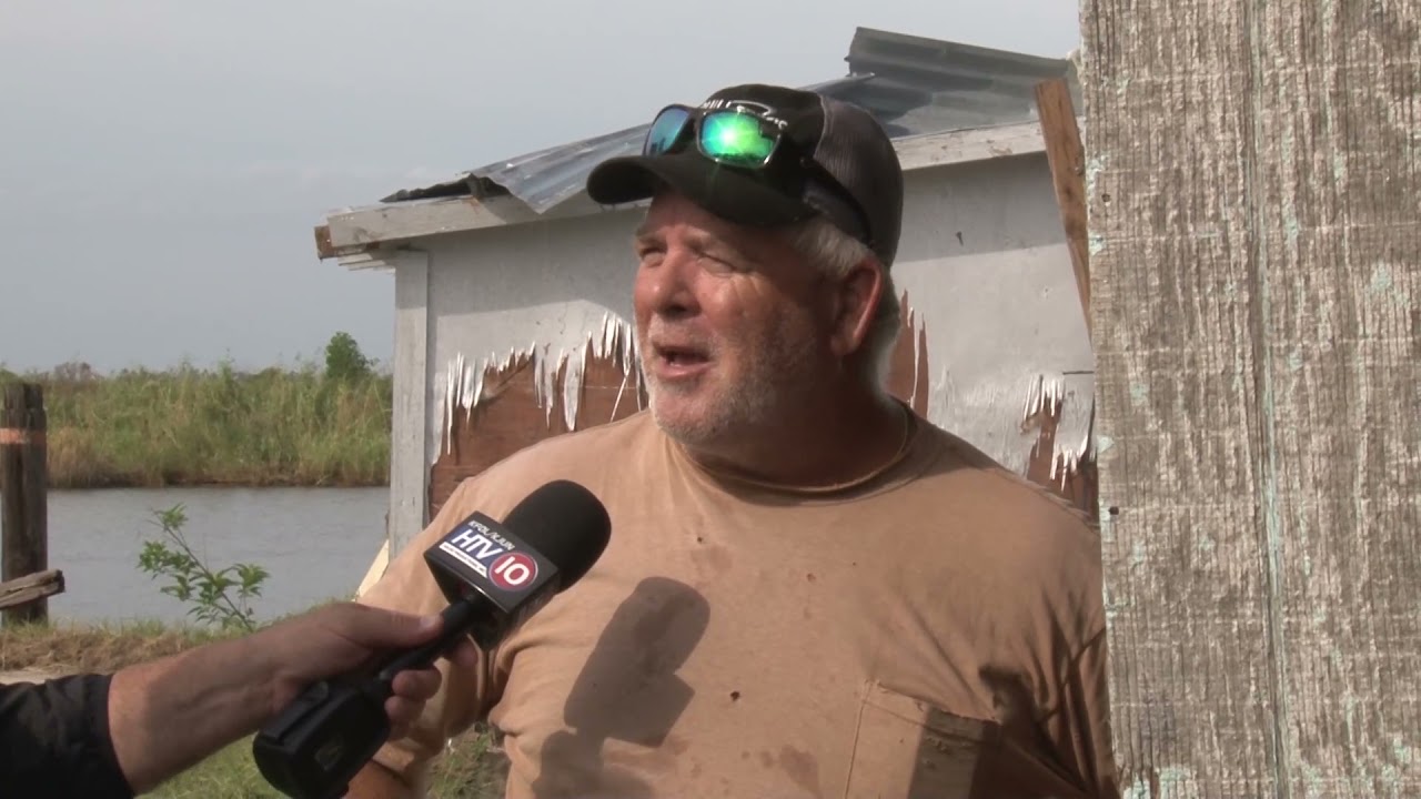 Martin Folse visits lower Montegut and talks with camp owner Ricky LeJeune.