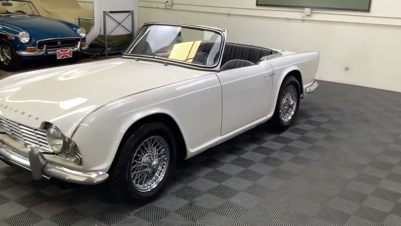 1963 TRIUMPH TR4 ROADSTER. SPA WHITE WITH BLACK LEATHER TRIM AND TOP