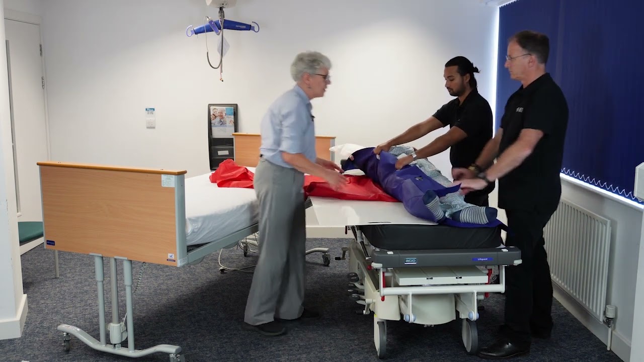 Lateral Transfer From a Trolley to the Bed Using a Slide Sheet & Transfer Sheet