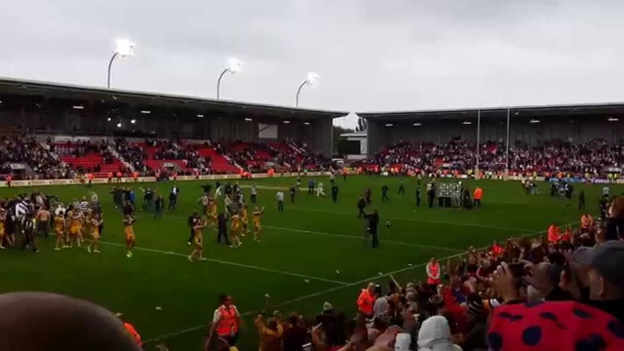 Widnes Fans invade pitch towards Cas Tigers Fans at Leigh Sports Village 10/08/14
