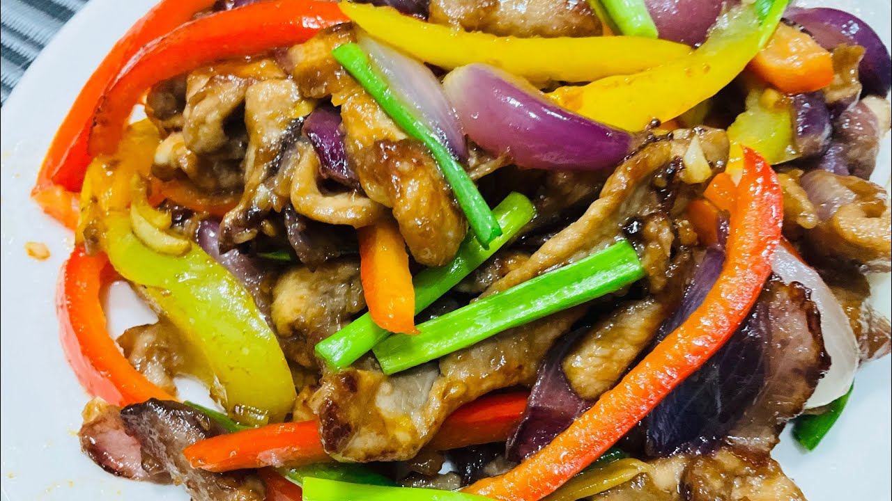 Juicy pork slices tossed with colorful capsicium simple, fast & flavourful
