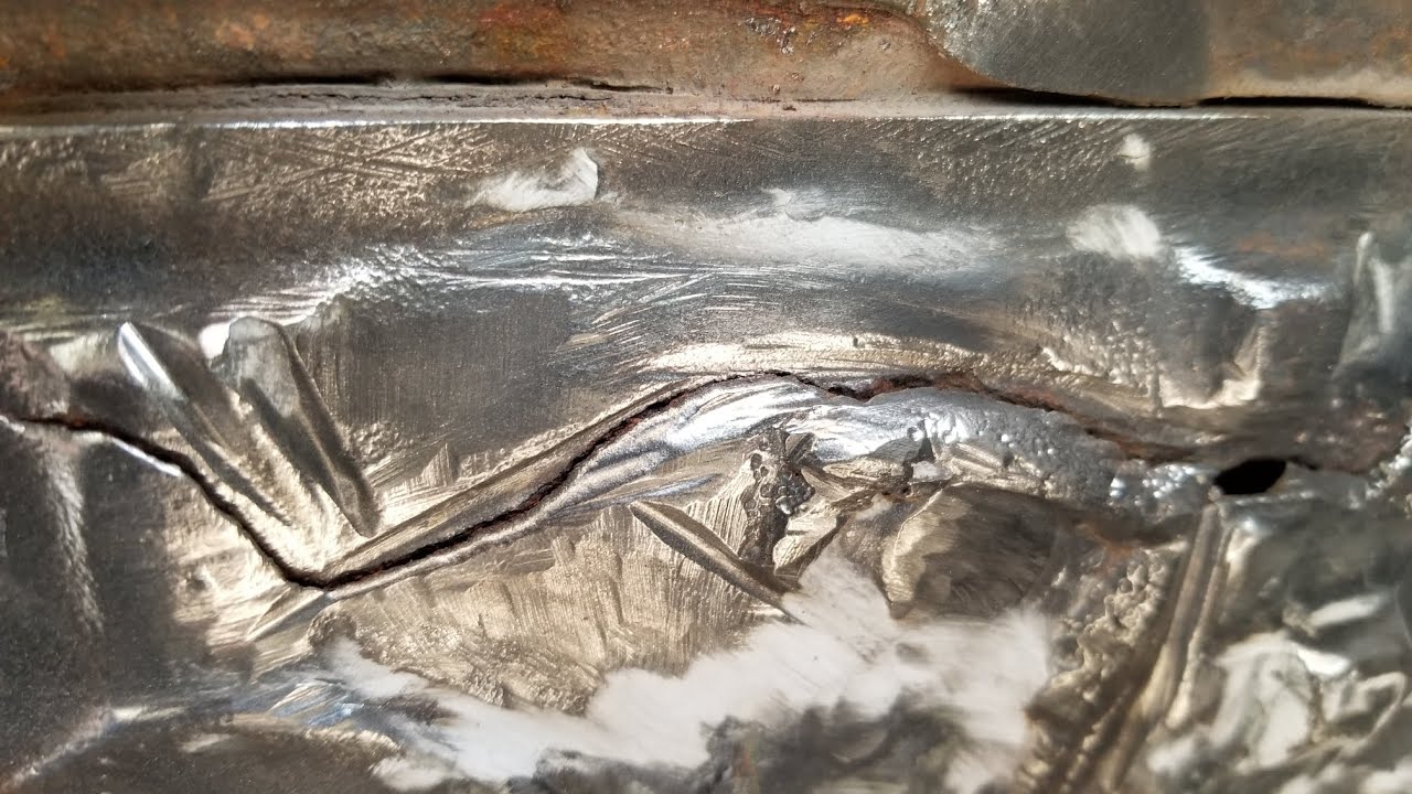 repairing a severely cracked boat engine block with JB weld. I promise, it works