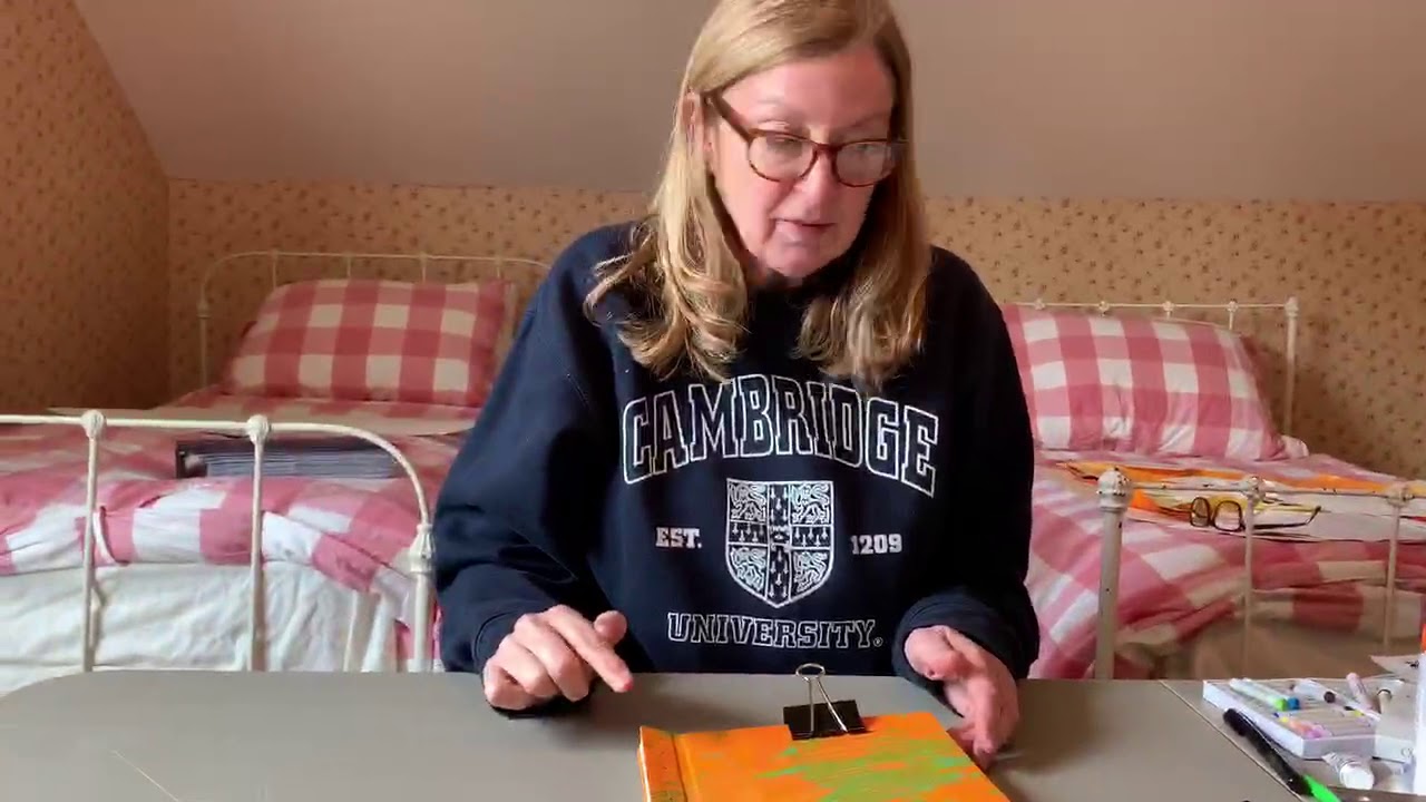 Professor Julie Brown Demonstrates Drilling Holes for Binding Books