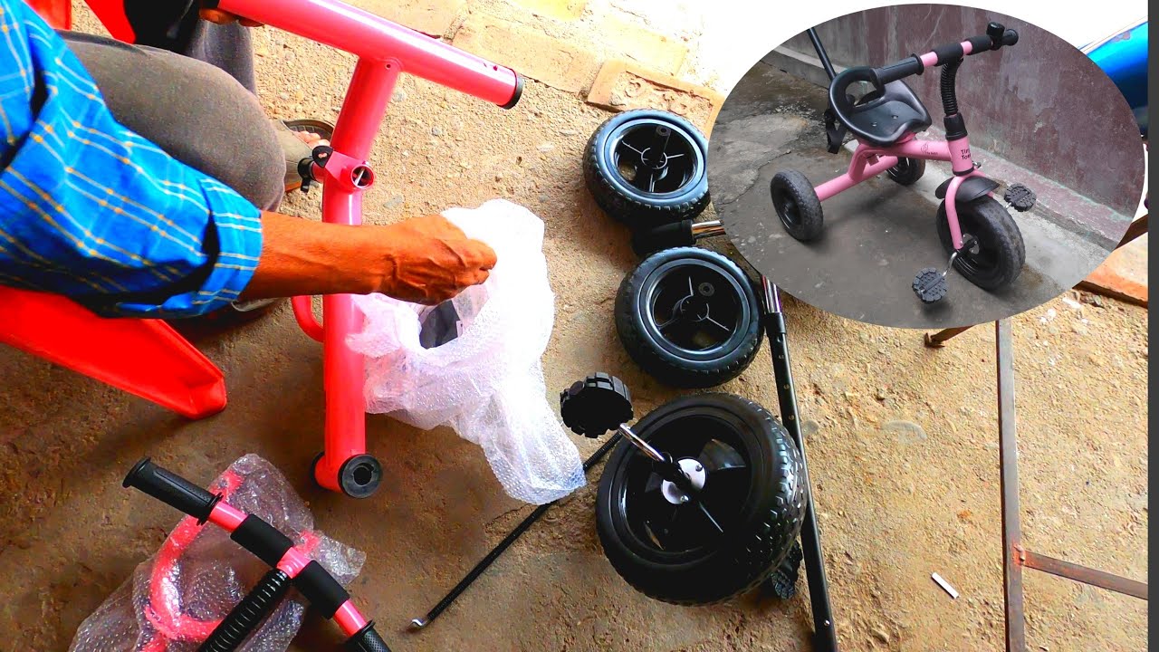 Assembling my kids tricycle : R for rabbit (Amazon delivery)