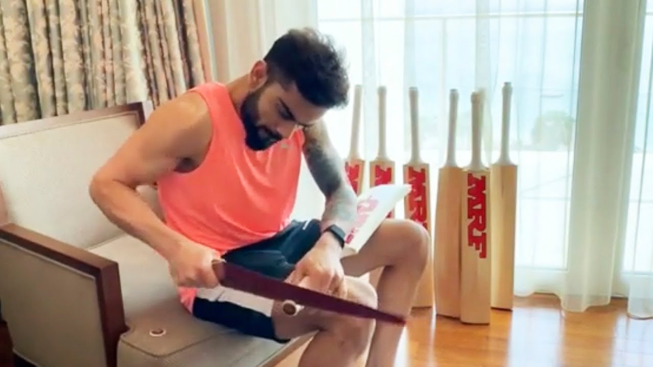 Cricketer Virat Kohli Taking Care Of His Old Bats