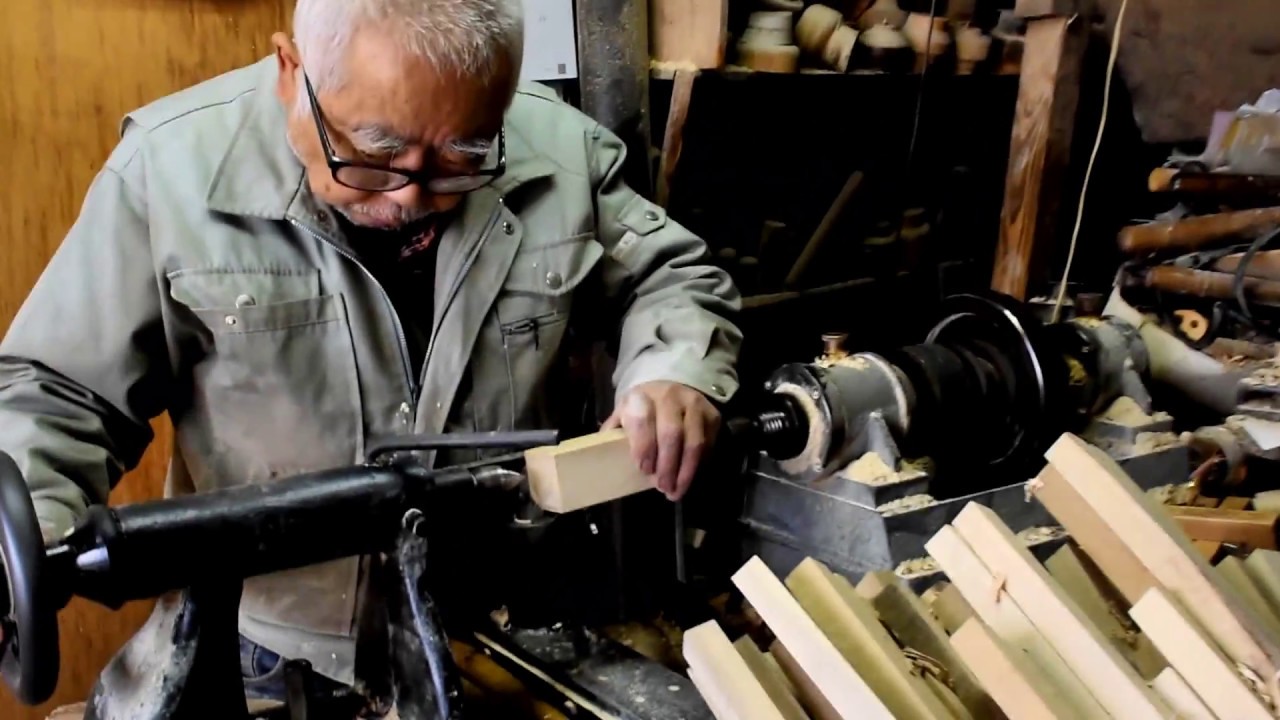 Mr Okura making a Kokeshi doll in Tokyo
