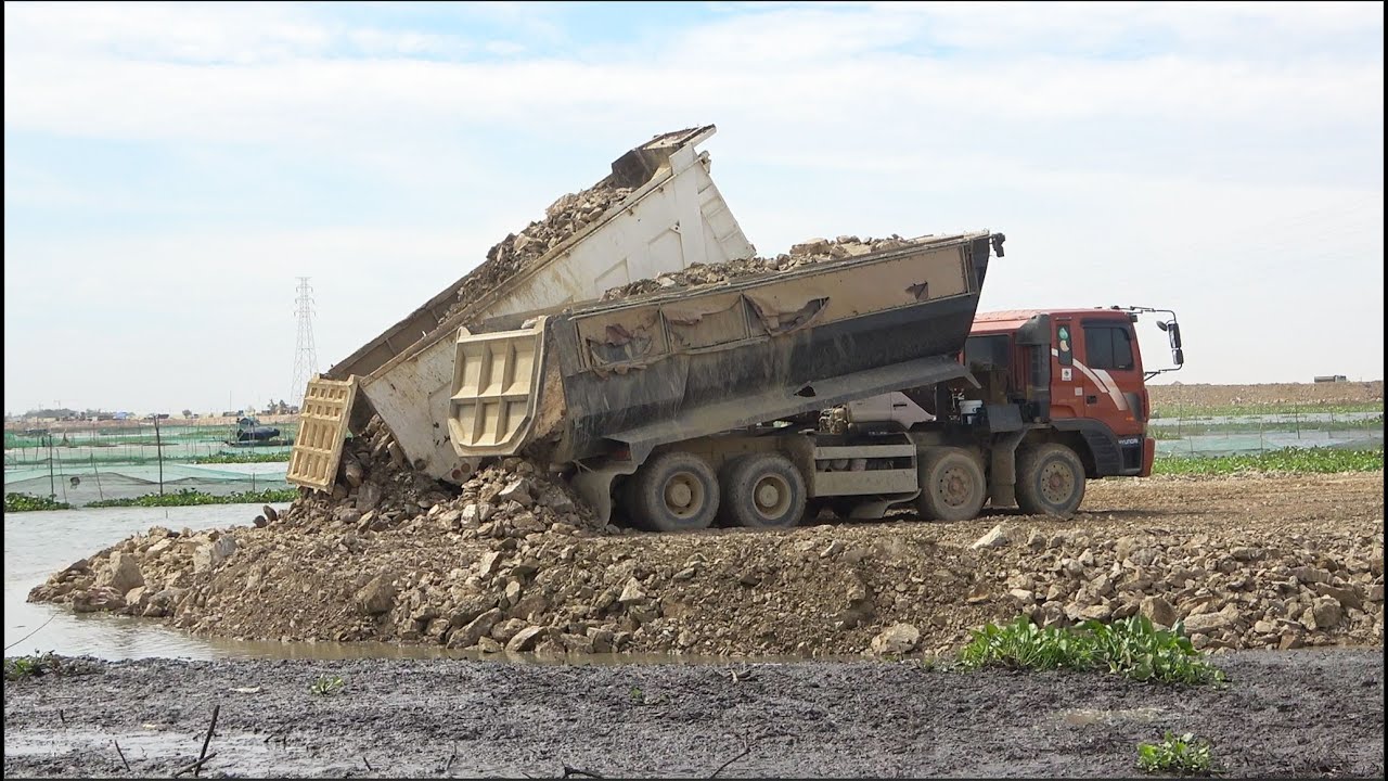 Incredible Dump Truck Dumping Stone Dozer Clearing With Grading Stone