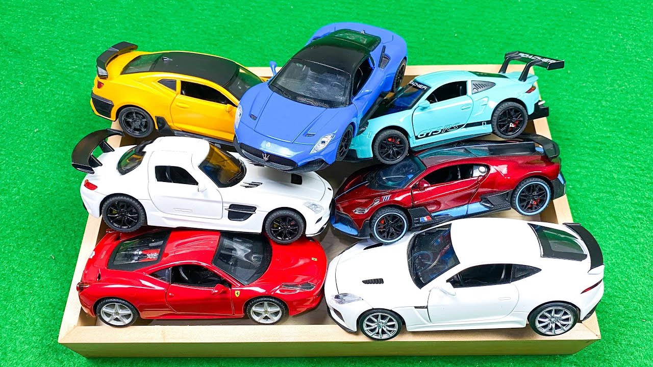 Box Full of Model Cars -Mazda Mx5, Koenigesgg Jesko, Lamborghini Scv12, Byd Yang Wang U8, Toyota Car