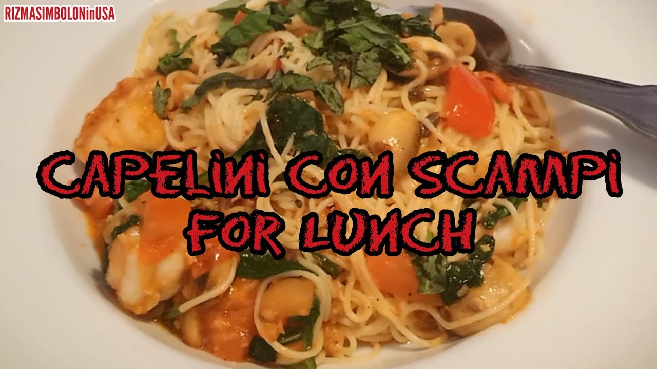 Cooking Capelini Con Scampi in Napoli restaurant kitchen