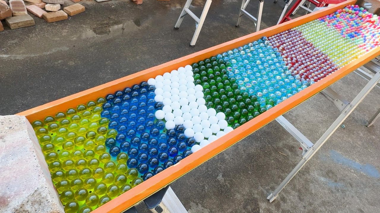 Make a water marble run course using a wiggly, wooden sound device and an aquarium. #ASMR