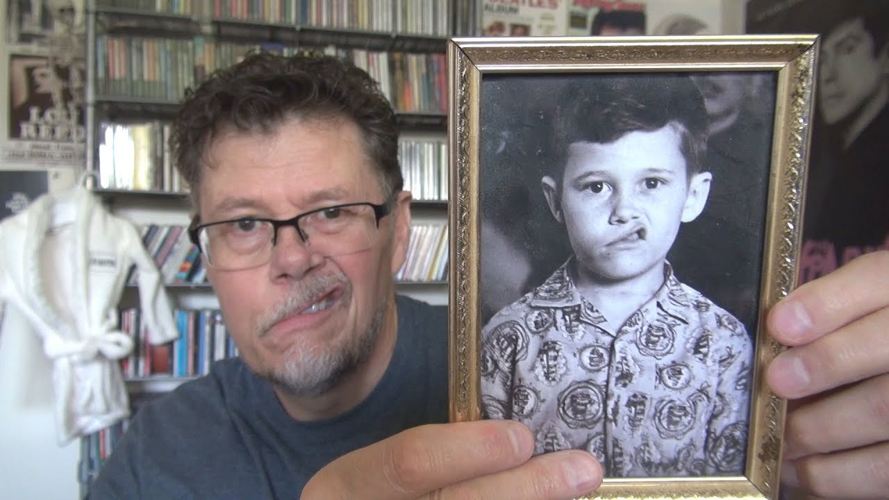 LOOKING AT OLD PHOTOGRAPHS AND MUSIC BOOKS