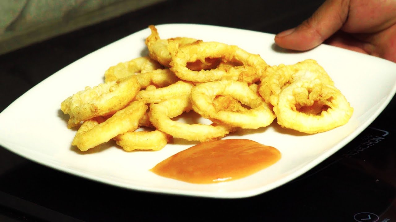 How to fry coated white squid. When it floats, it's done.