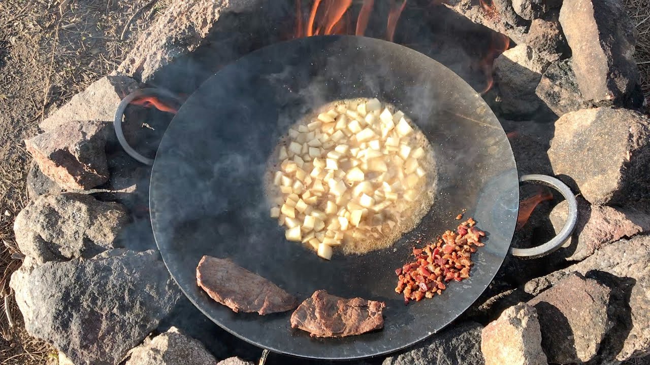 loaded campfire potatoes on the cowboy wok