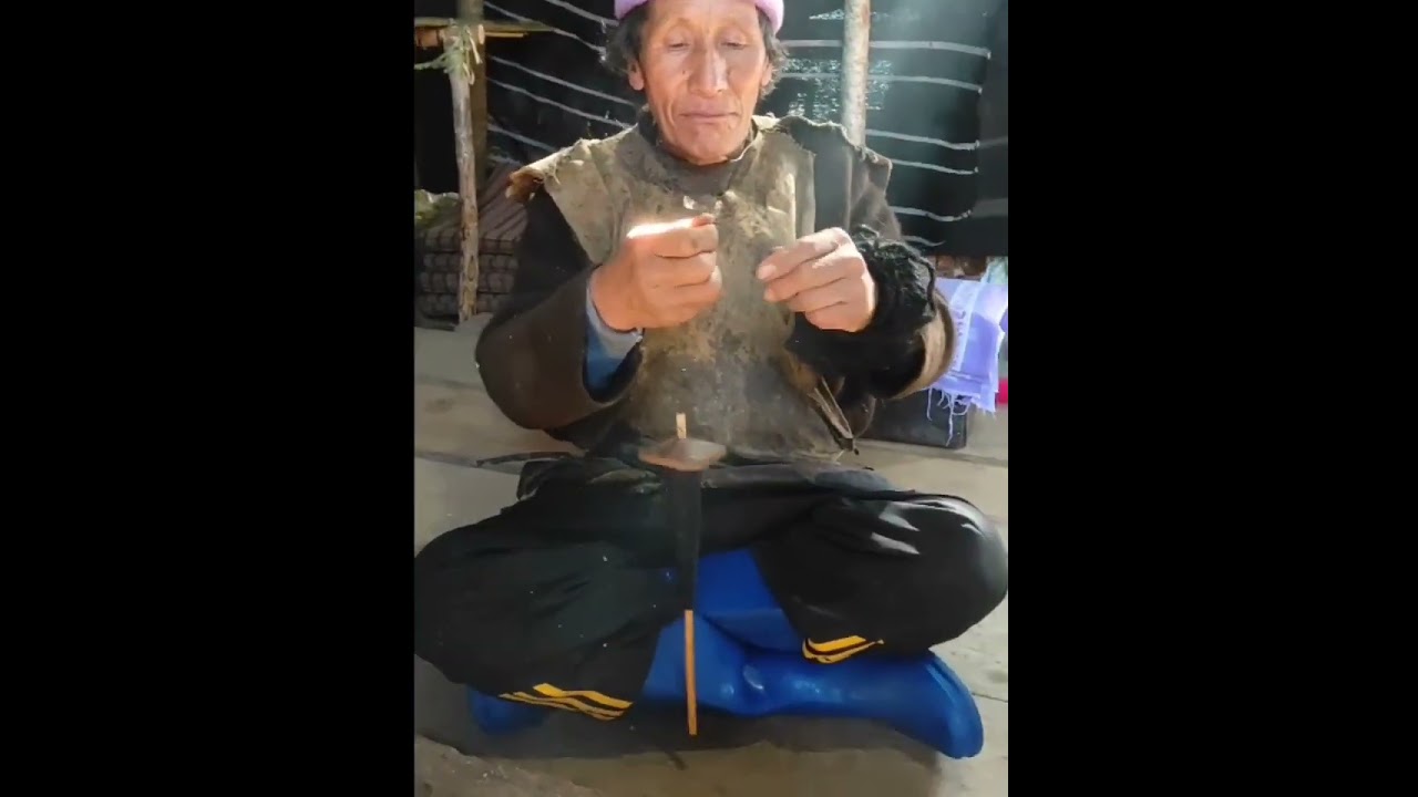 A Brokpa weaving a Yak wool in Traditional way....