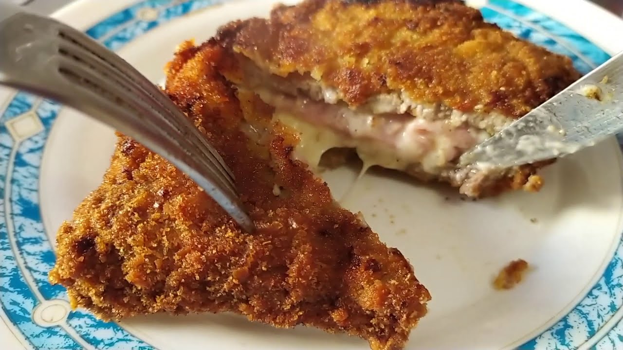 Bistec Uruguayo empanizado relleno con jamón y queso