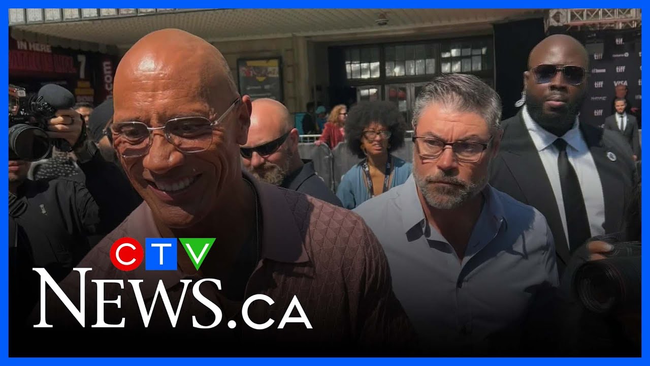The Rock reunites with members of his family on the TIFF red carpet