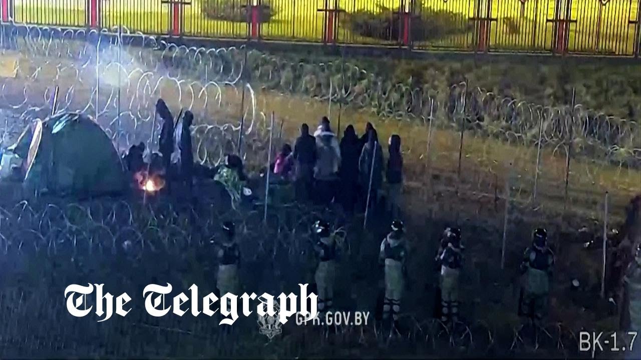 Belarus shows migrants stuck between two wire fences at Poland border