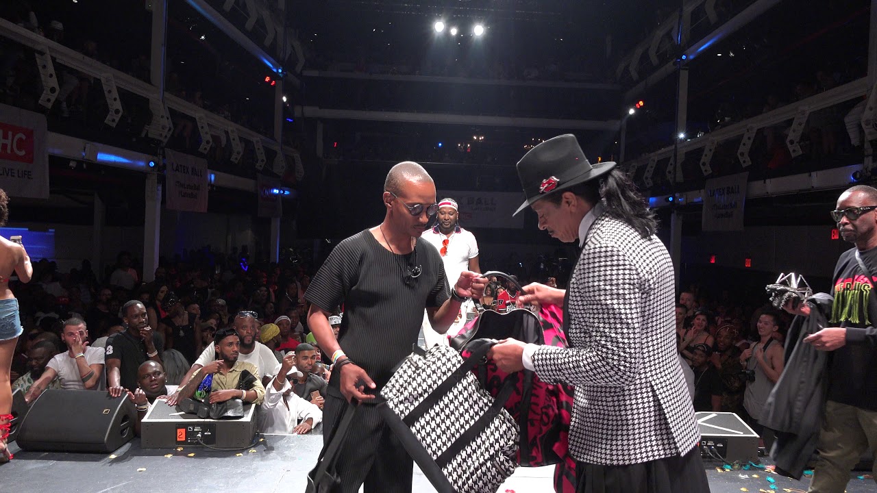 Labels @ Latex Ball 2018 Icon John Moschino