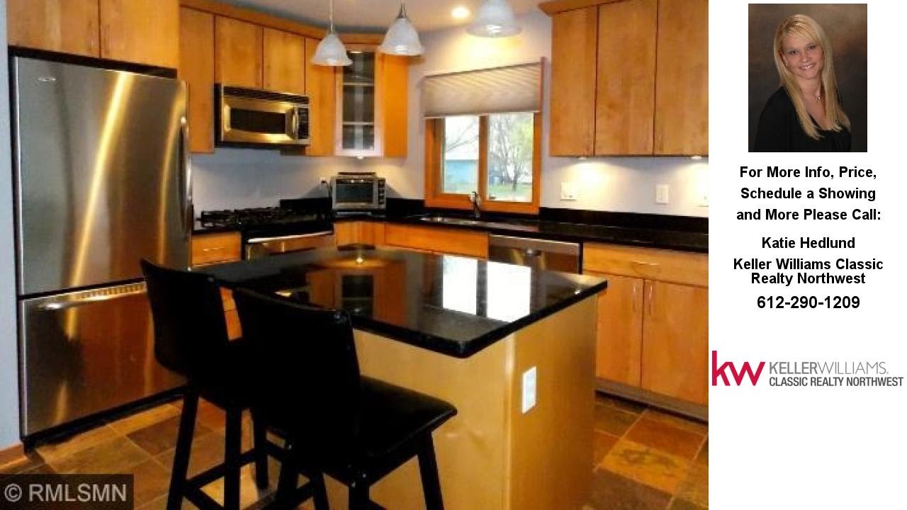 2638 Louisa Avenue, Mounds View, MN Presented by Katie Hedlund.