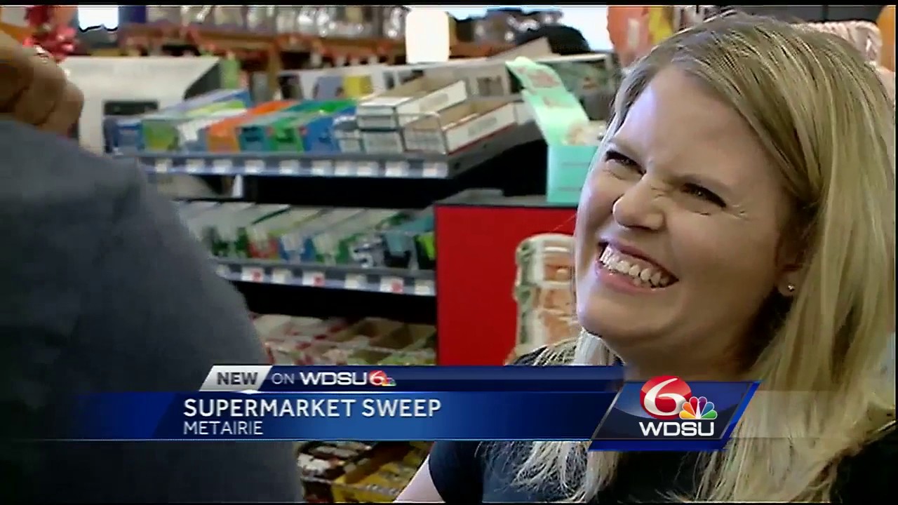 How much did Randi Rousseau and Charles Divins get for the Supermarket Sweep for charity?