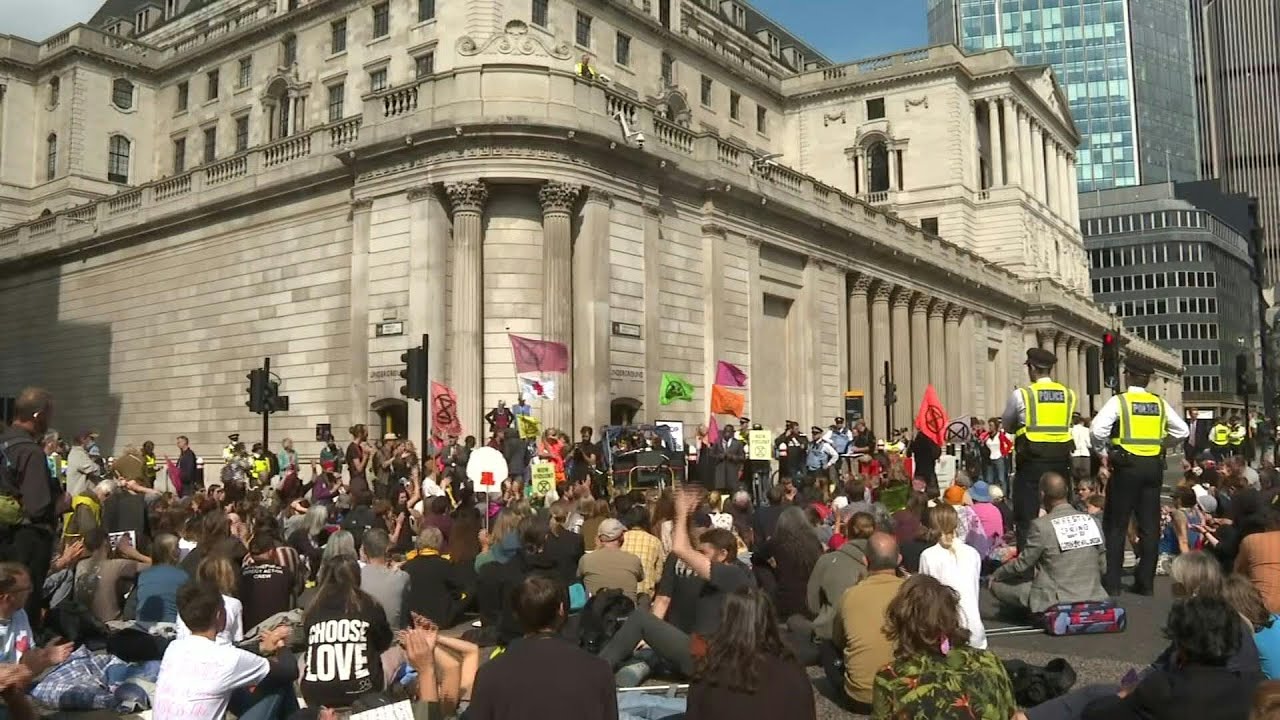 Extinction Rebellion block roads outside Bank of England in London | AFP