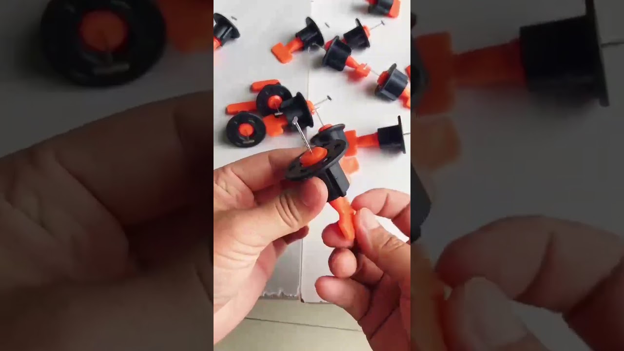 Reusable tile leveling system