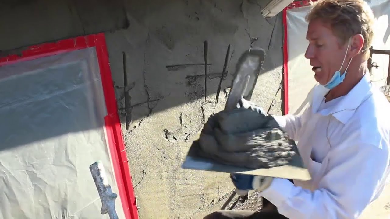 Apply Stucco evenly on walls or around windows.