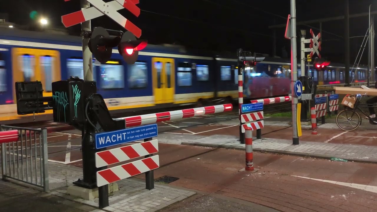 Railroad Crossing in The Netherlands at Night.