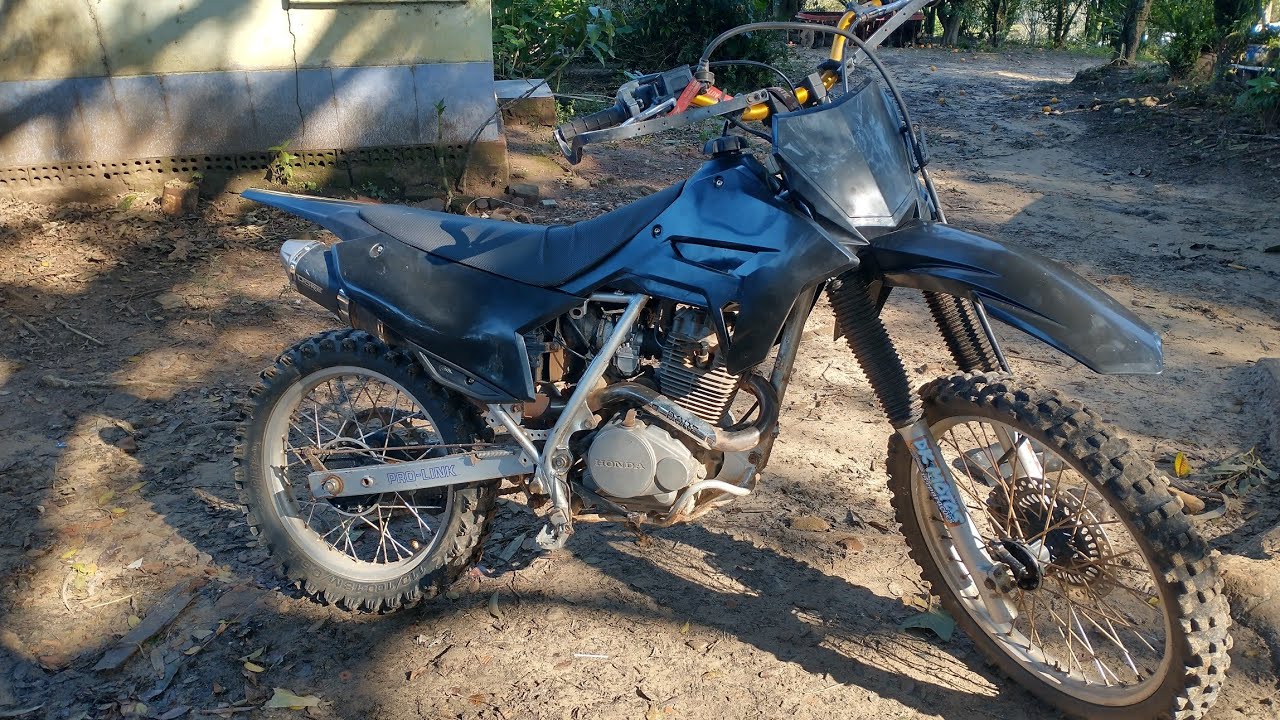 como adaptar roupa da crf na XR200/ NX200 (levantando pedaleiras)...🤩