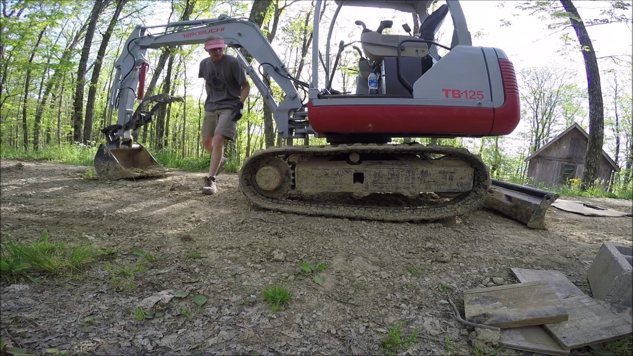 (Как установить) Цилиндр натяжения гусеницы Takeuchi