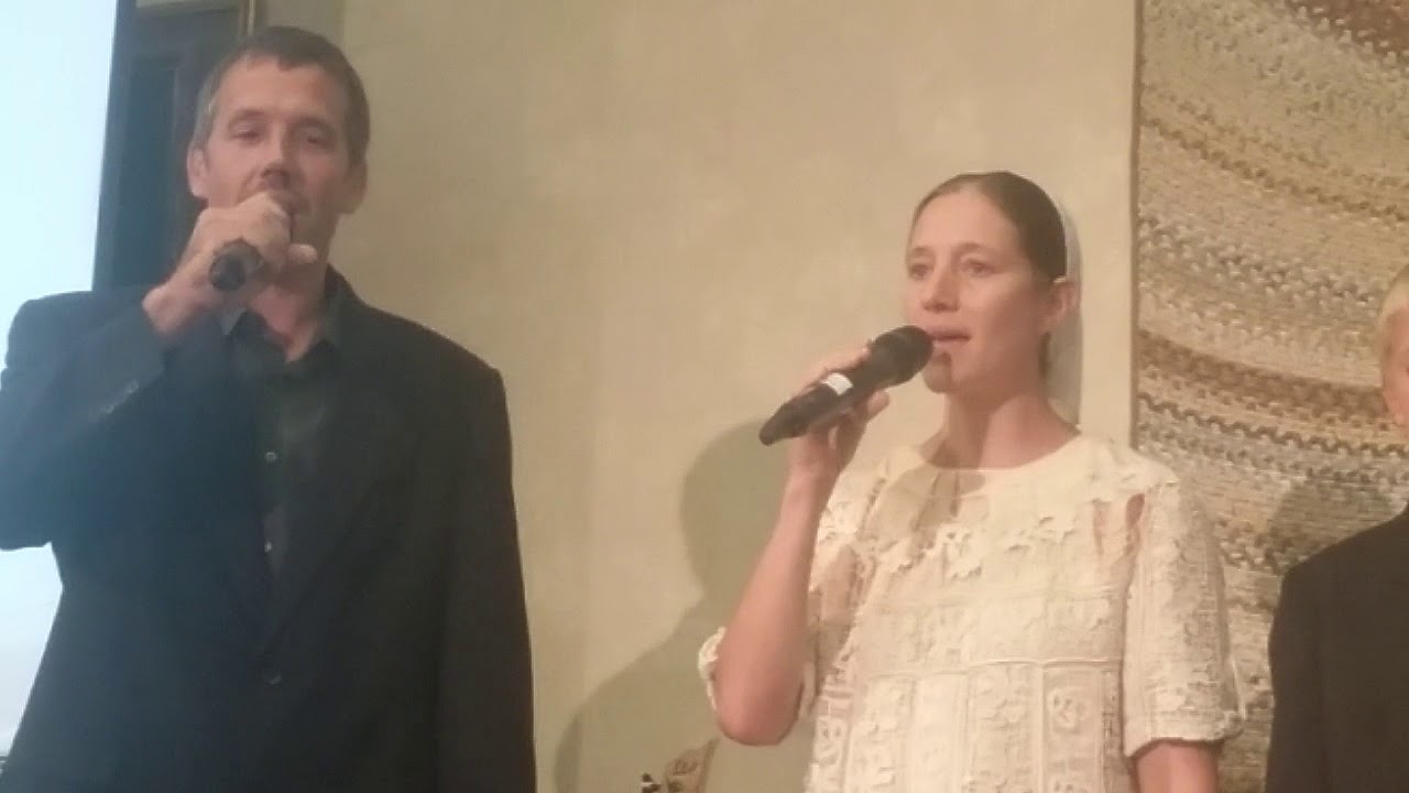 The stoltzfus family singing his yoke is easy at gospel express banquet
