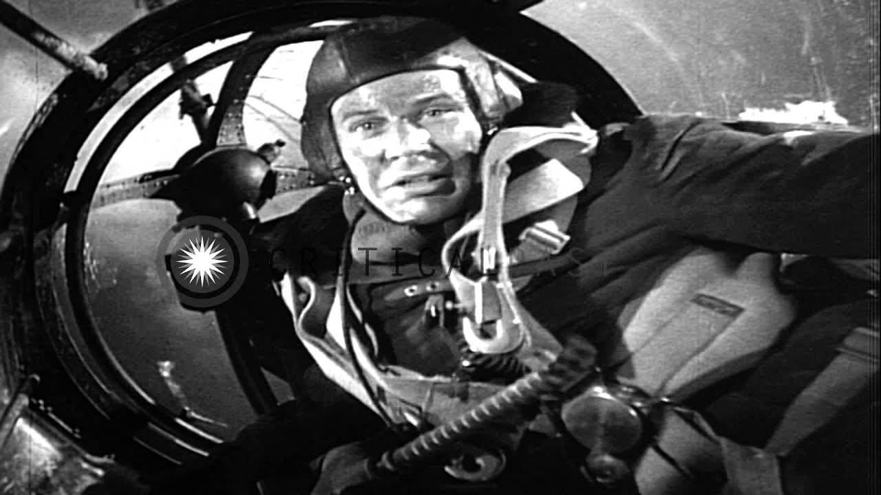 German propaganda film excerpt: He-111 bomber is attacked by British P-36 Mohawk...HD Stock Footage