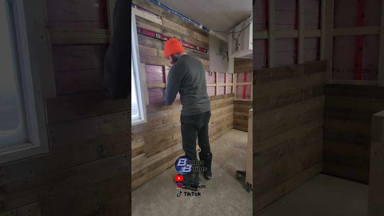 Covering Workshop Walls with pallet wood planks  #woodworking #workshopbuild #diy #palletwood