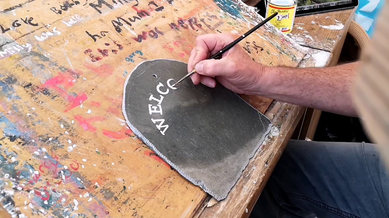 Robin painting on slate