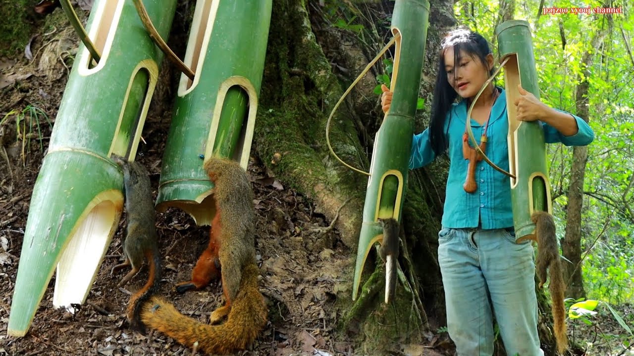 สาวดอย เดีนป่าดักกระรอกด้วยบั้งไม้ใผ่ Walk in the forest to trap squirrels with bamboo sticks