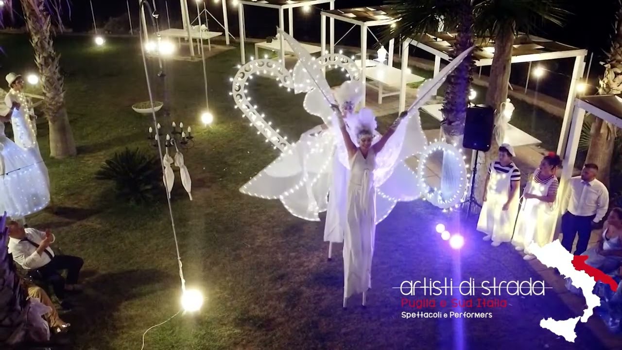 Farfalle luminose spettacoli di artisti da strada sui trampoli - Matrimonio Puglia
