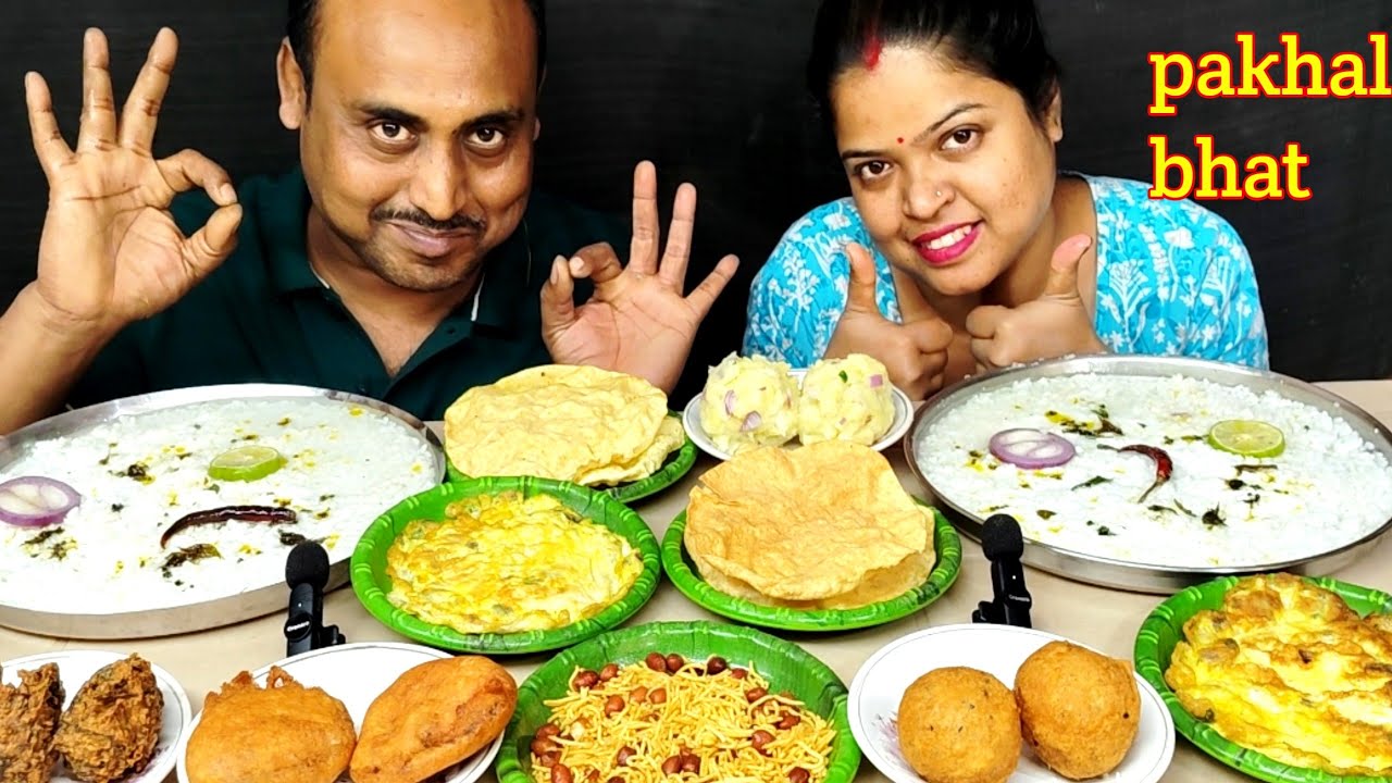 ODISHA PAKHAL BHAT /PANTA BHAT EATING CHALLENGE CHOP PAKODA PHURULI EGG OMELETTE PAPAD EATING 