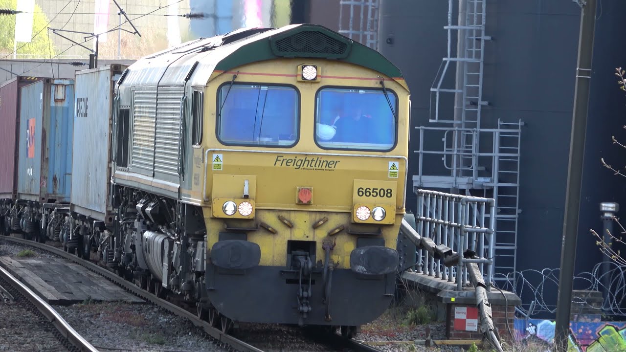 London Overground and freight trains at Hackney Wick station