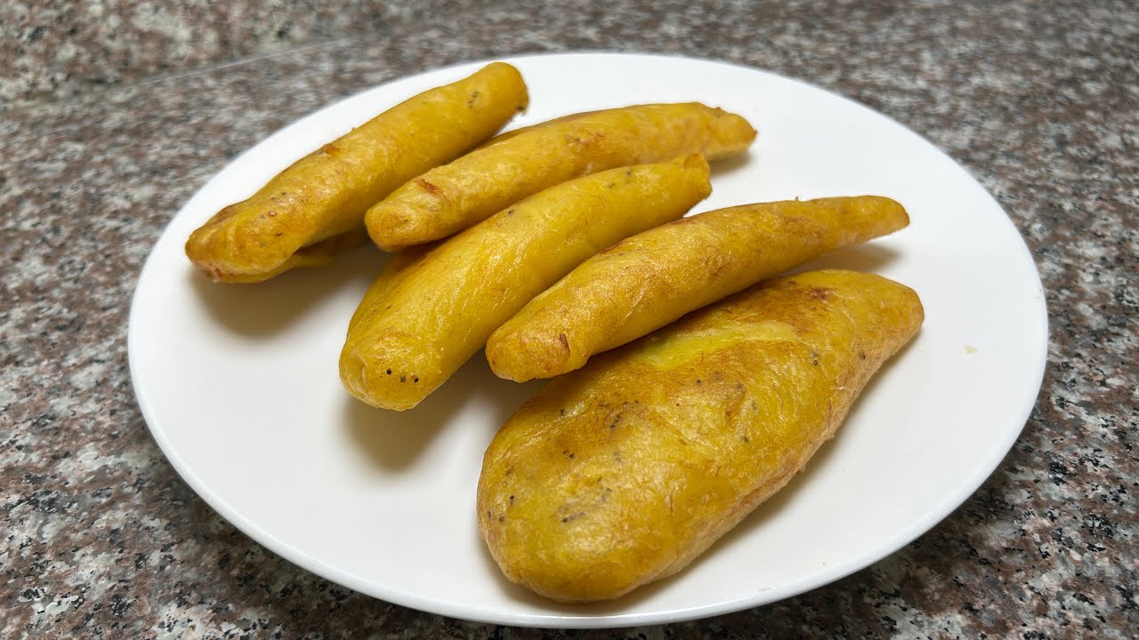 Delicious Yellow Plantain Empanadas W/Refried Beans & Cheese 