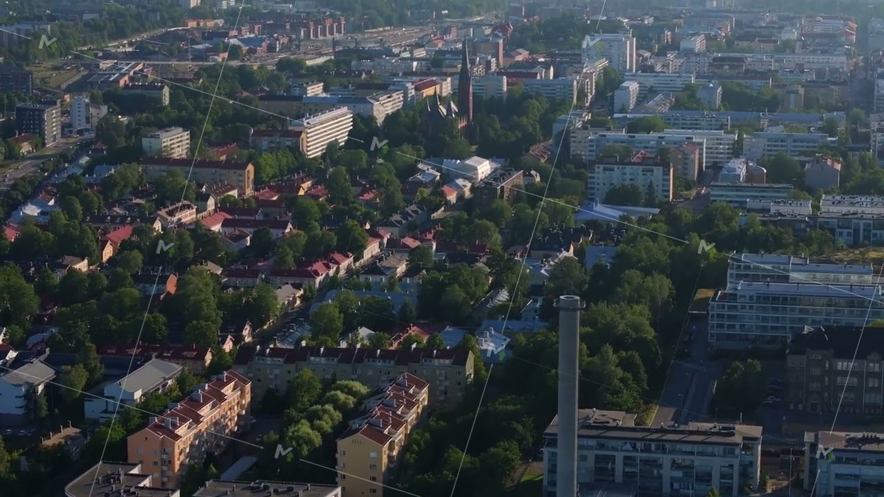 Aerial view of Turku, Finland showcasing the cityscape with a mix of residential buildings, lush