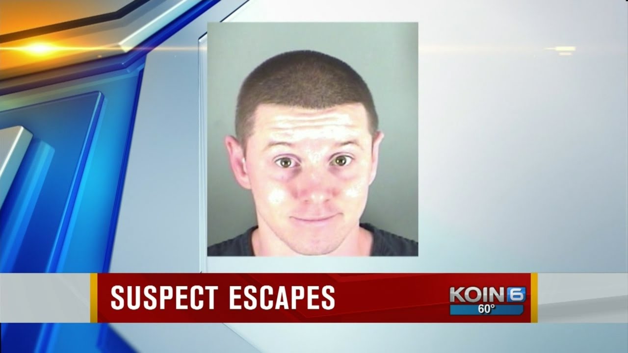 Suspect in handcuffs escapes custody in Clark Co.