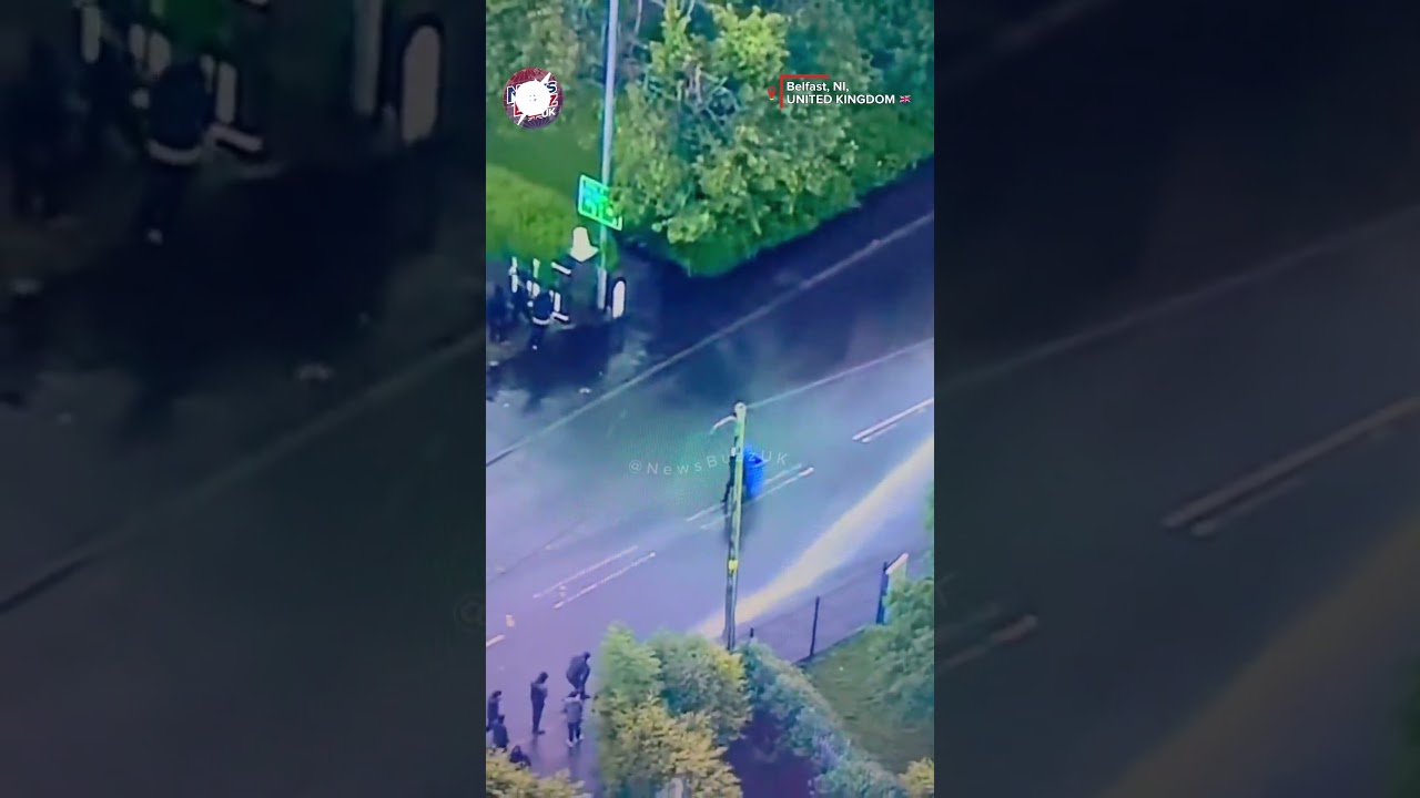 2 Men Try Fighting Belfast Police Water Cannon With a Wheelie Bin